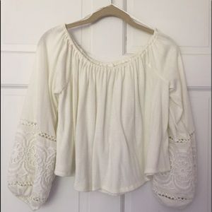 A Honey and Thyme off the shoulder shirt.